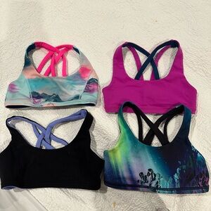 Four Ivivva Lululemon Girls size 8T reversible sports bras